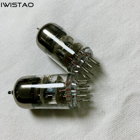 Two silver-colored vacuum tubes, model 6H3n, placed on a light fabric surface.