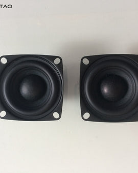 A pair of black 2-inch full range speaker units with a square design and a central speaker cone.