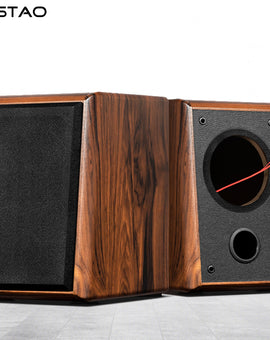 A pair of IWISTAO 5 inch full range speakers with a wooden front and black PVC leather, featuring a high density MDF board and a circular pin holes on the front panel.